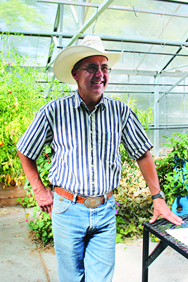 Standing in the greenhouse that he and his students built over four years, Bill Lombardi was honored with the National FFA Teacher of the Year award in 2009.