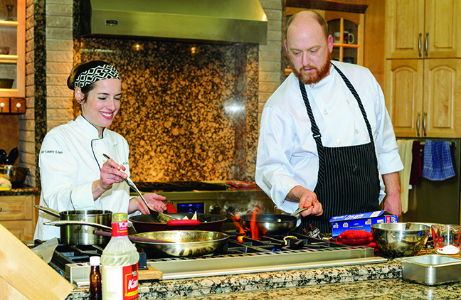 Above: The finalists share stove space as time winds down.  Left: Lee and Towers round out the competition with dessert. Ronnau commented, “I could have bathed in the anglaise” created by Towers.